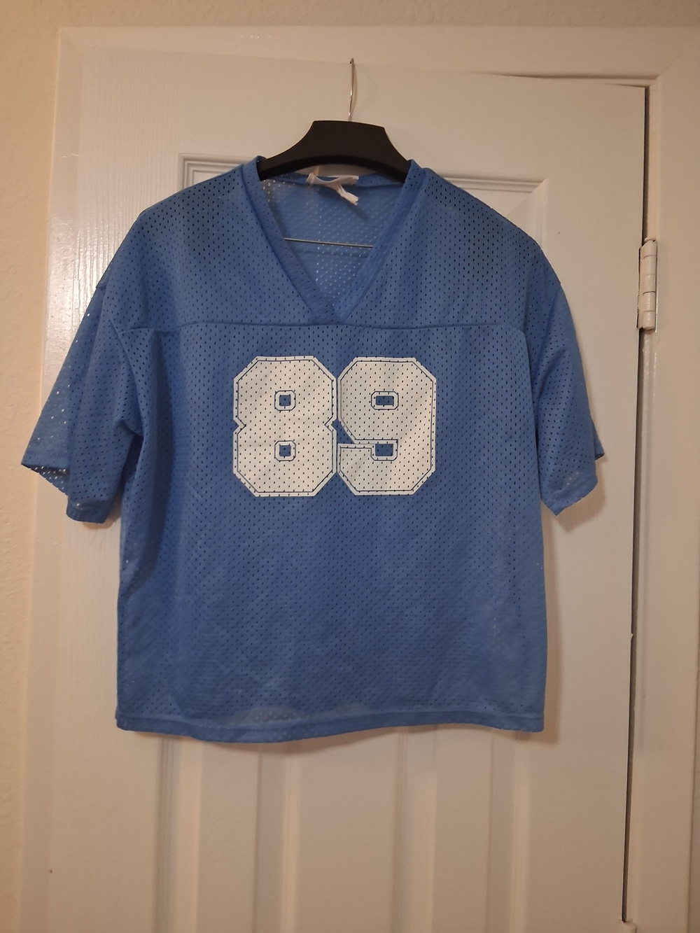 Starlet light blue mesh football jersey top 🏈
Size M